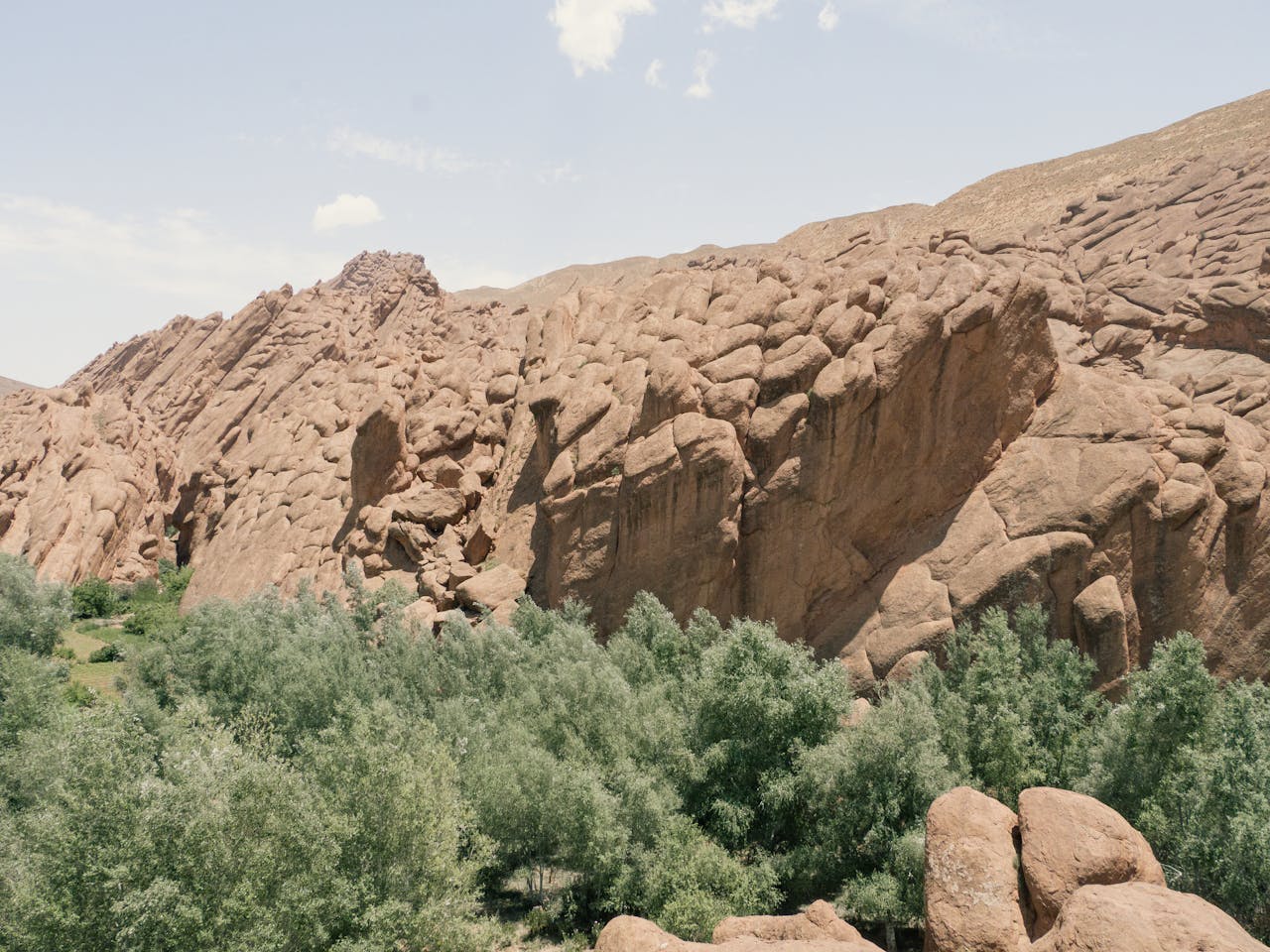 Stunning view of rocky landscape in Ait Ouglif, Morocco under clear skies.